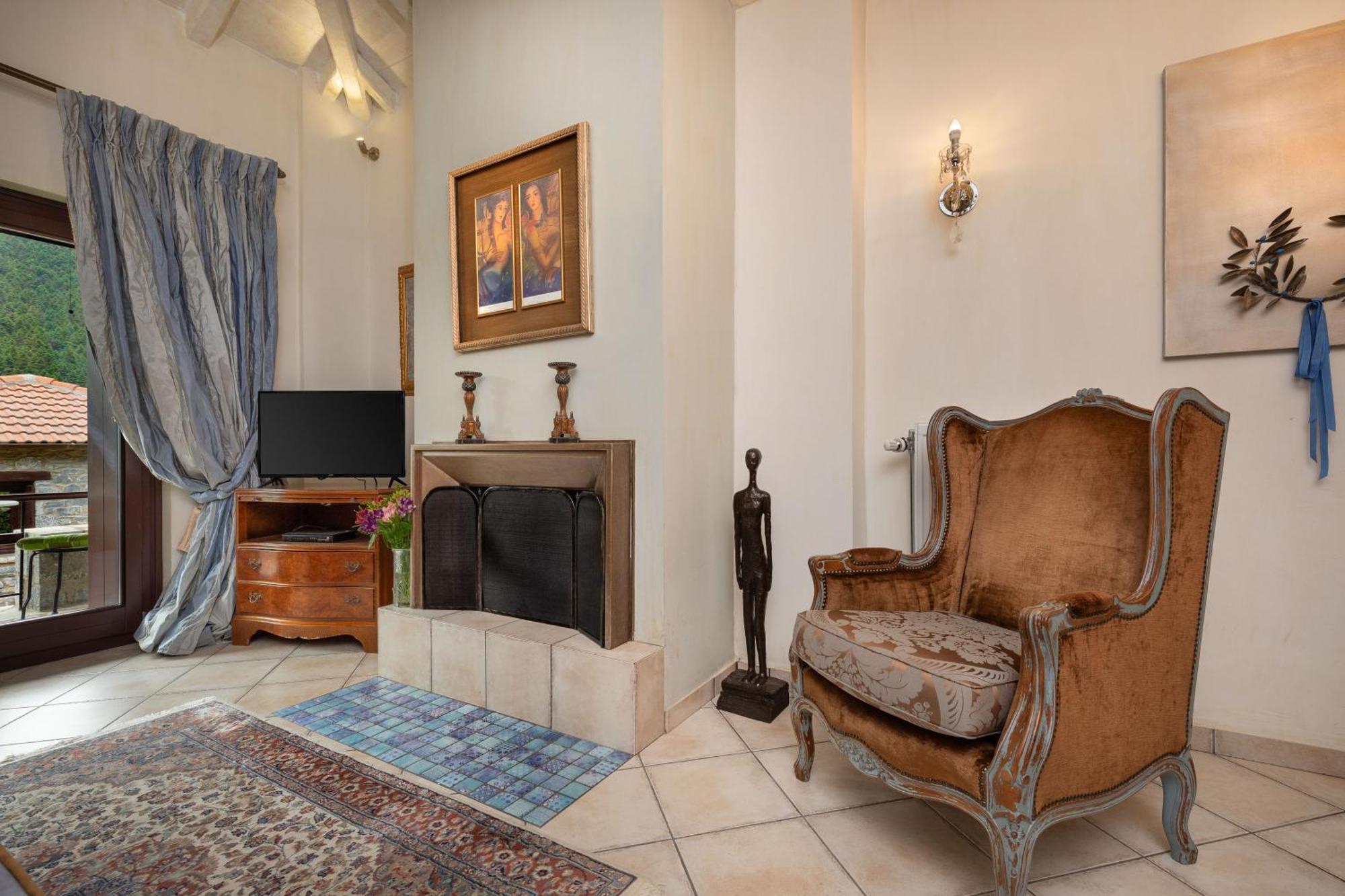 Ostra Menalon Luxury Suites Kardharás Habitación foto